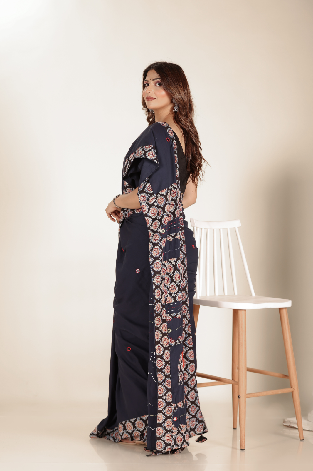 Navy Blue saree features intricate cotton applique work