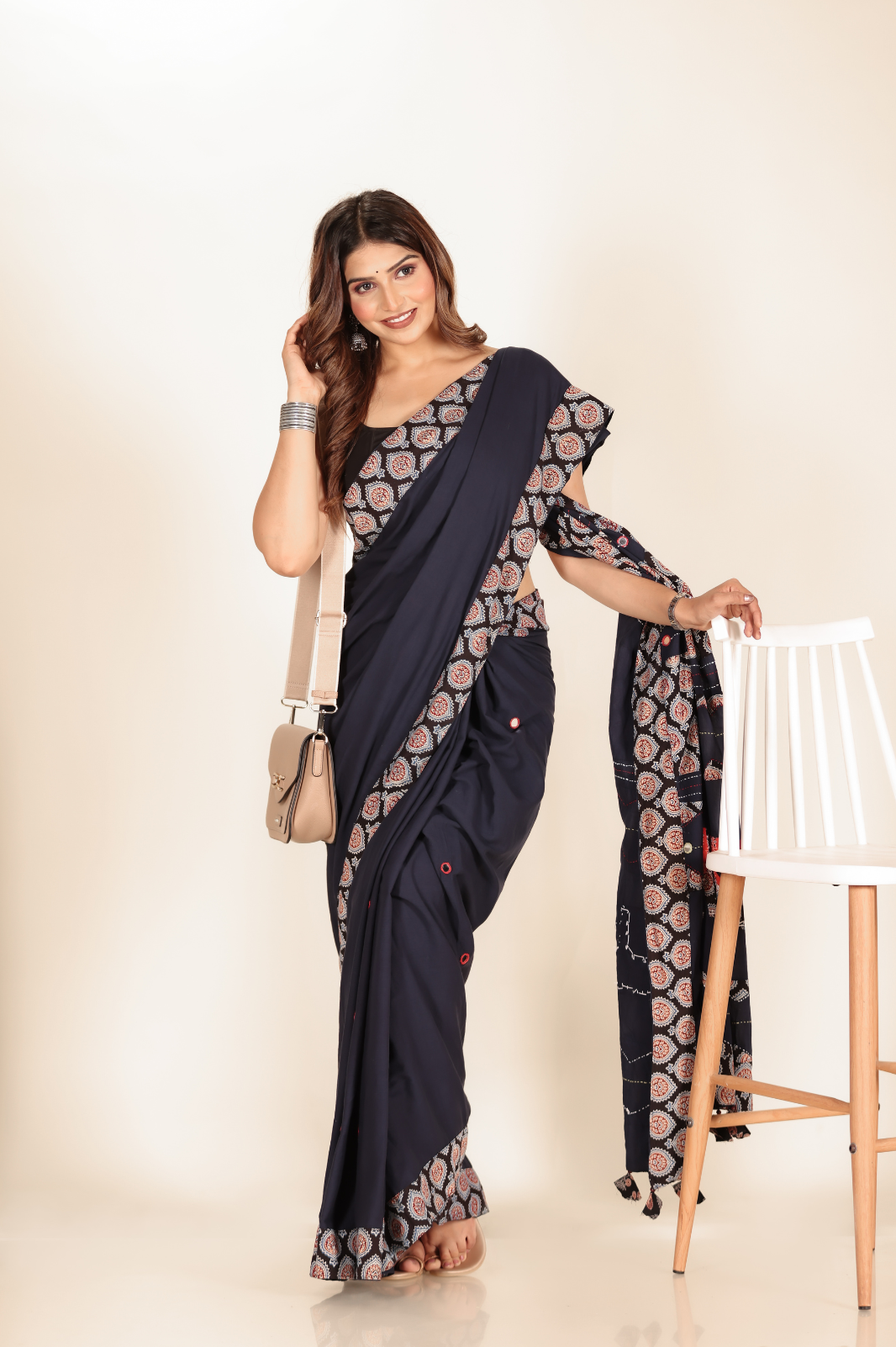 Navy Blue saree features intricate cotton applique work