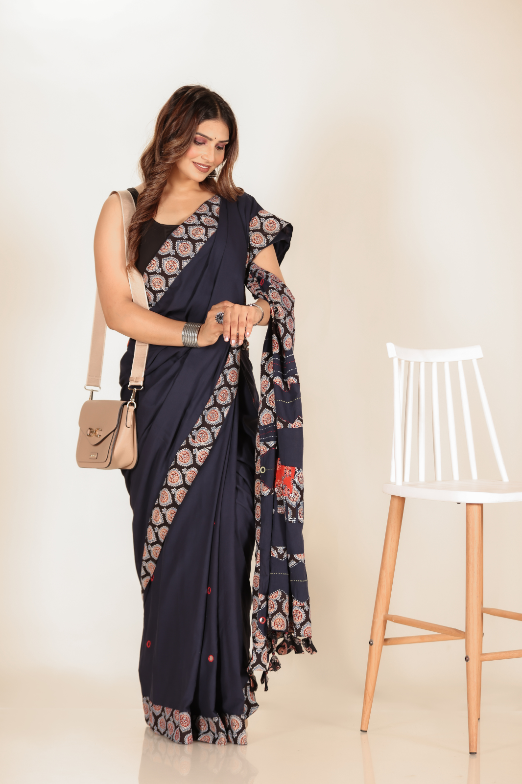 Navy Blue saree features intricate cotton applique work