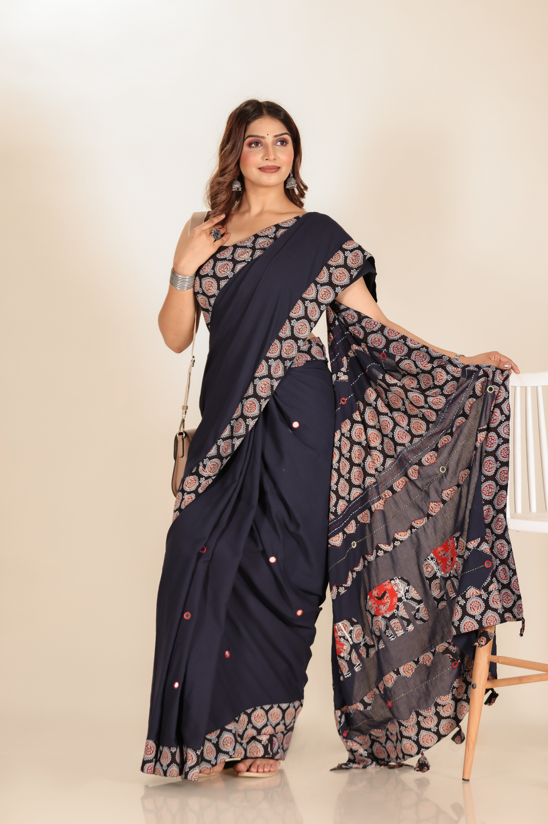 Navy Blue saree features intricate cotton applique work