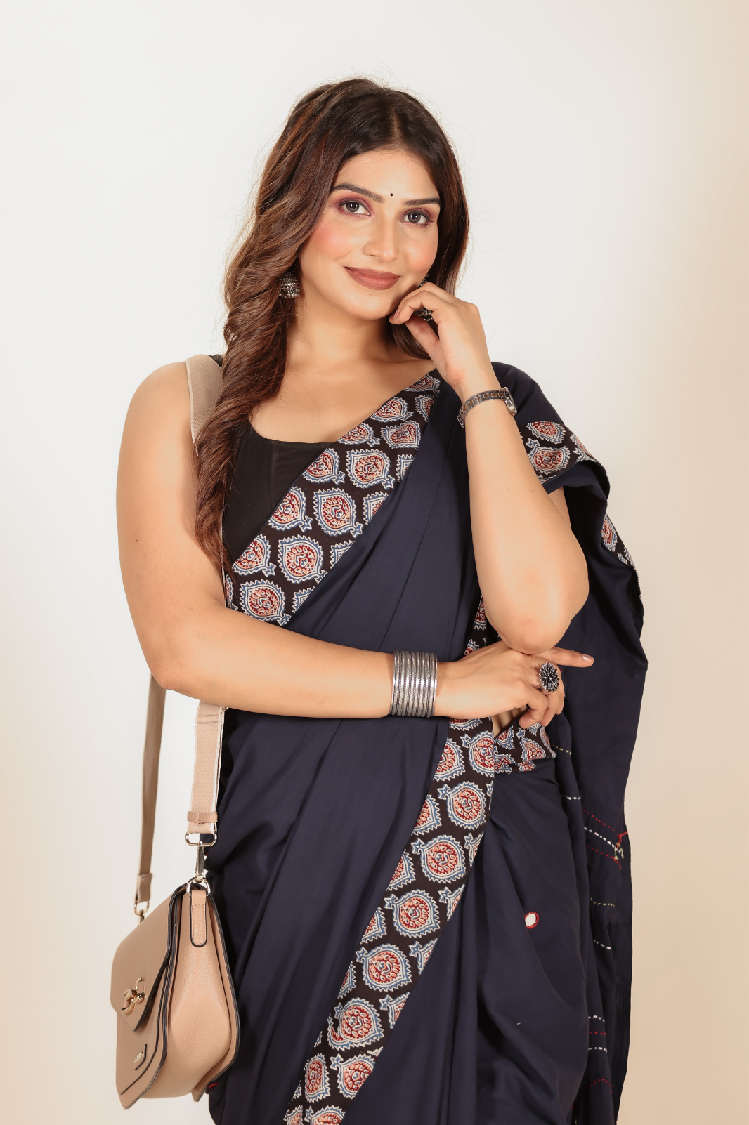 Navy Blue saree features intricate cotton applique work