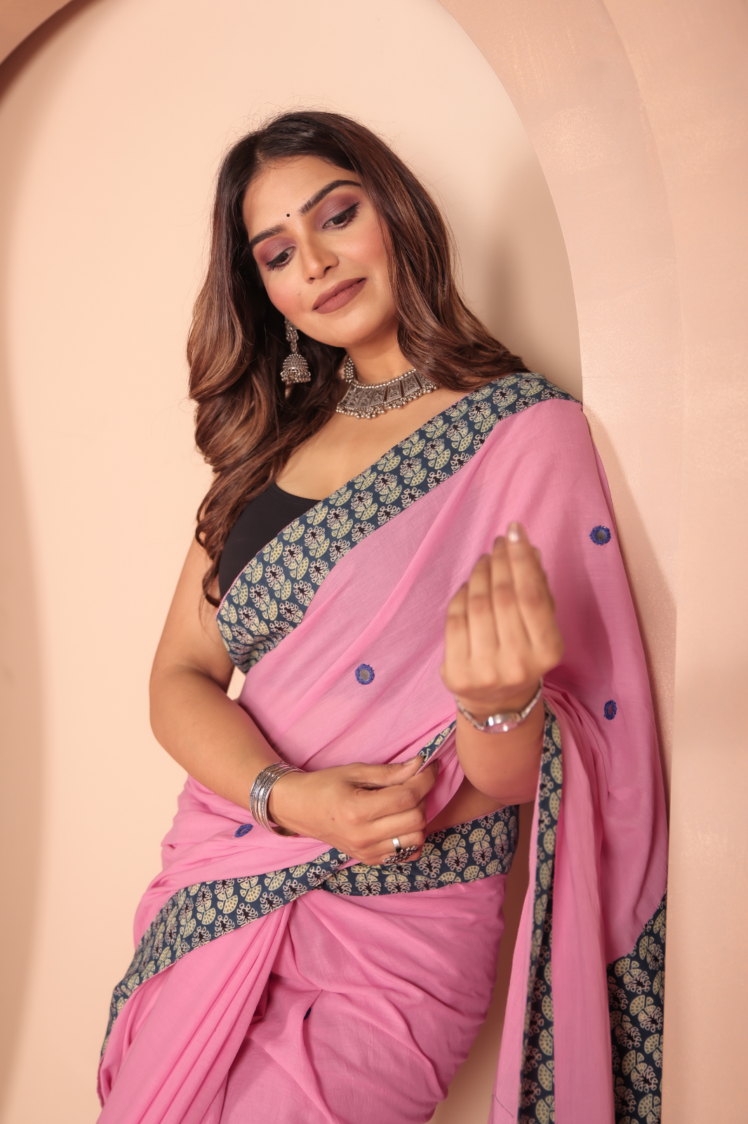 Pink saree features intricate cotton applique work