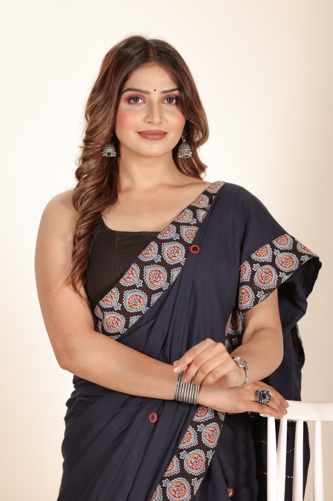 Navy Blue saree features intricate cotton applique work