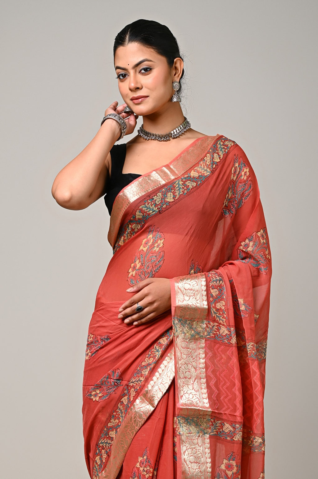 Coral Meher chiffon saree close view of handblock print and zari border