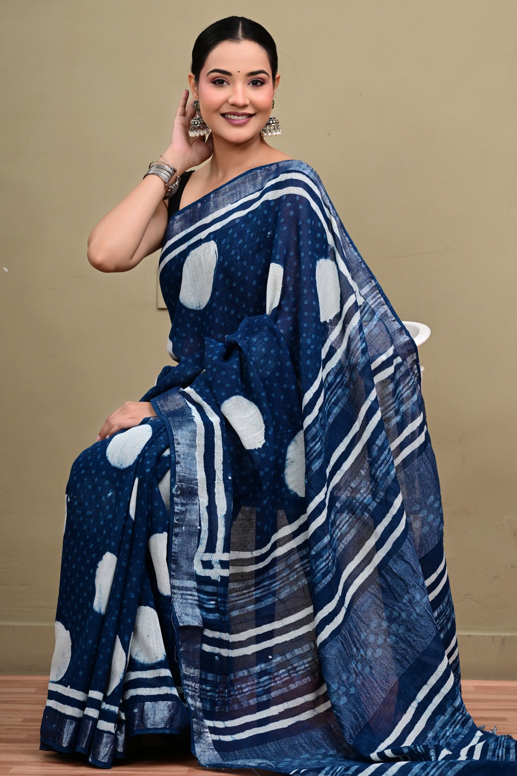 Indigo Orbit linen cotton handblock printed saree seated drape view