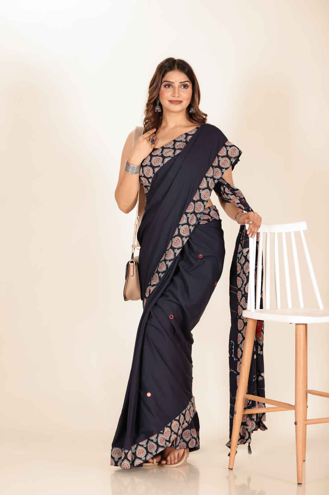 Navy Blue saree features intricate cotton applique work