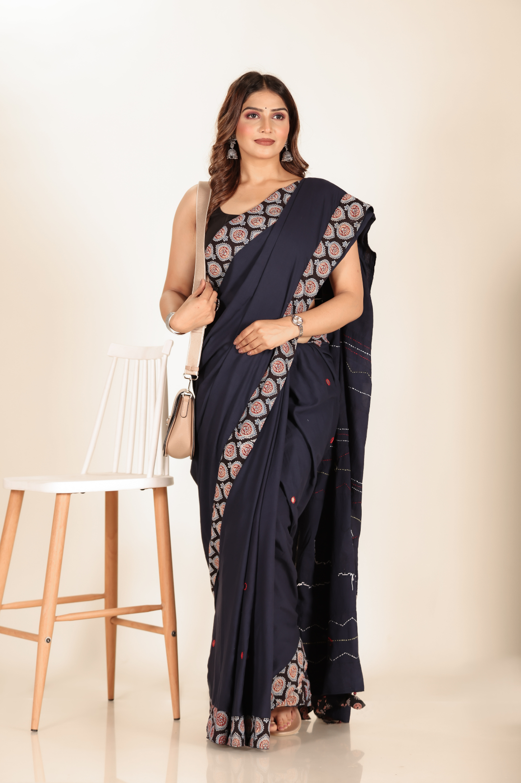 Navy Blue saree features intricate cotton applique work