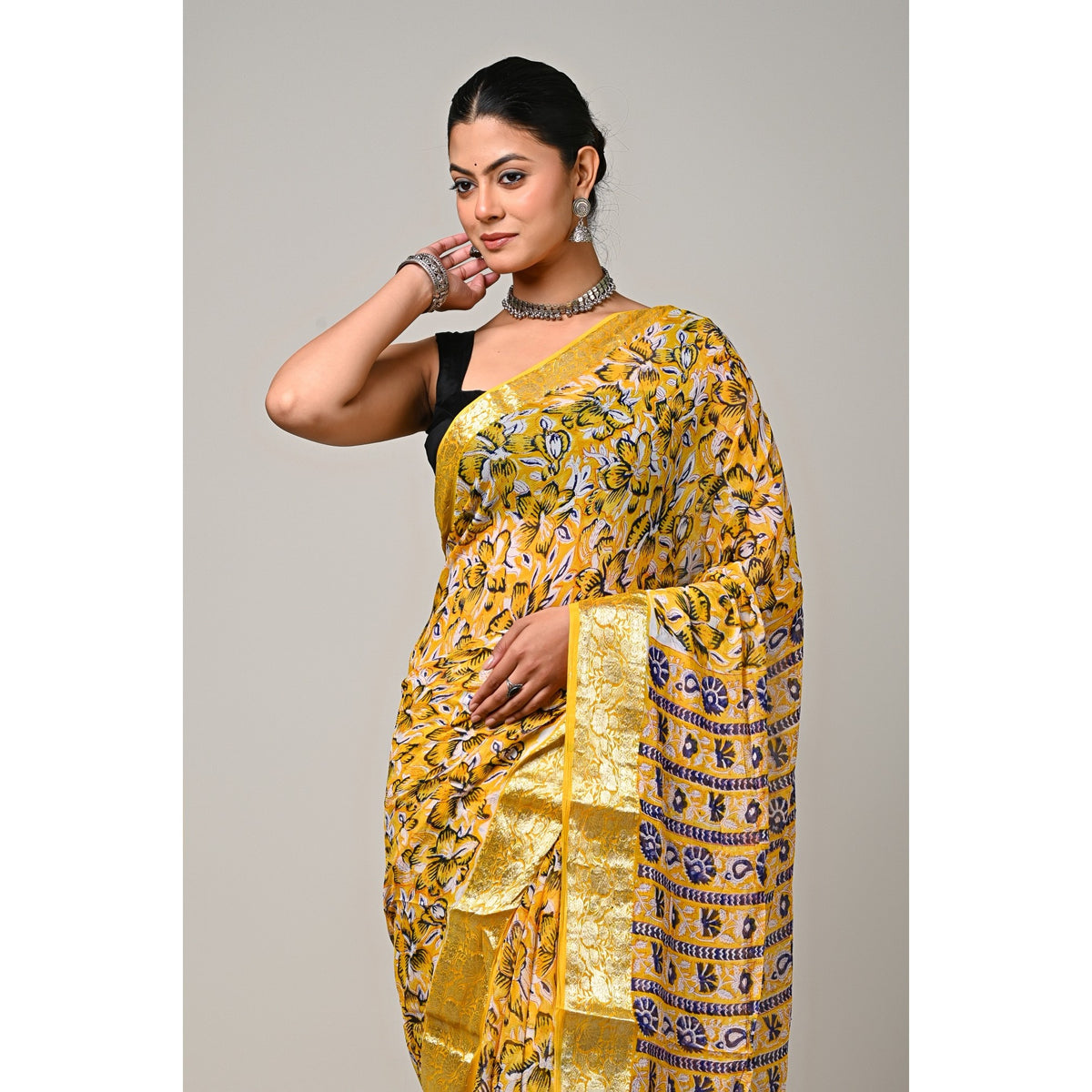 Sunset Bloom viscose chiffon natural handblock printed saree close-up floral and zari border