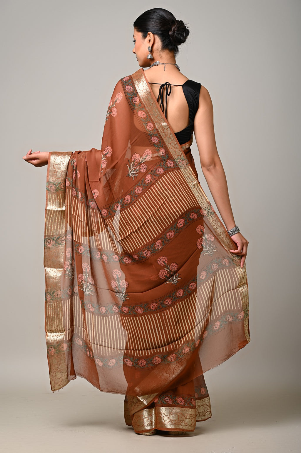 Rust brown chiffon saree pallu with floral handblock motifs stripes and metallic border