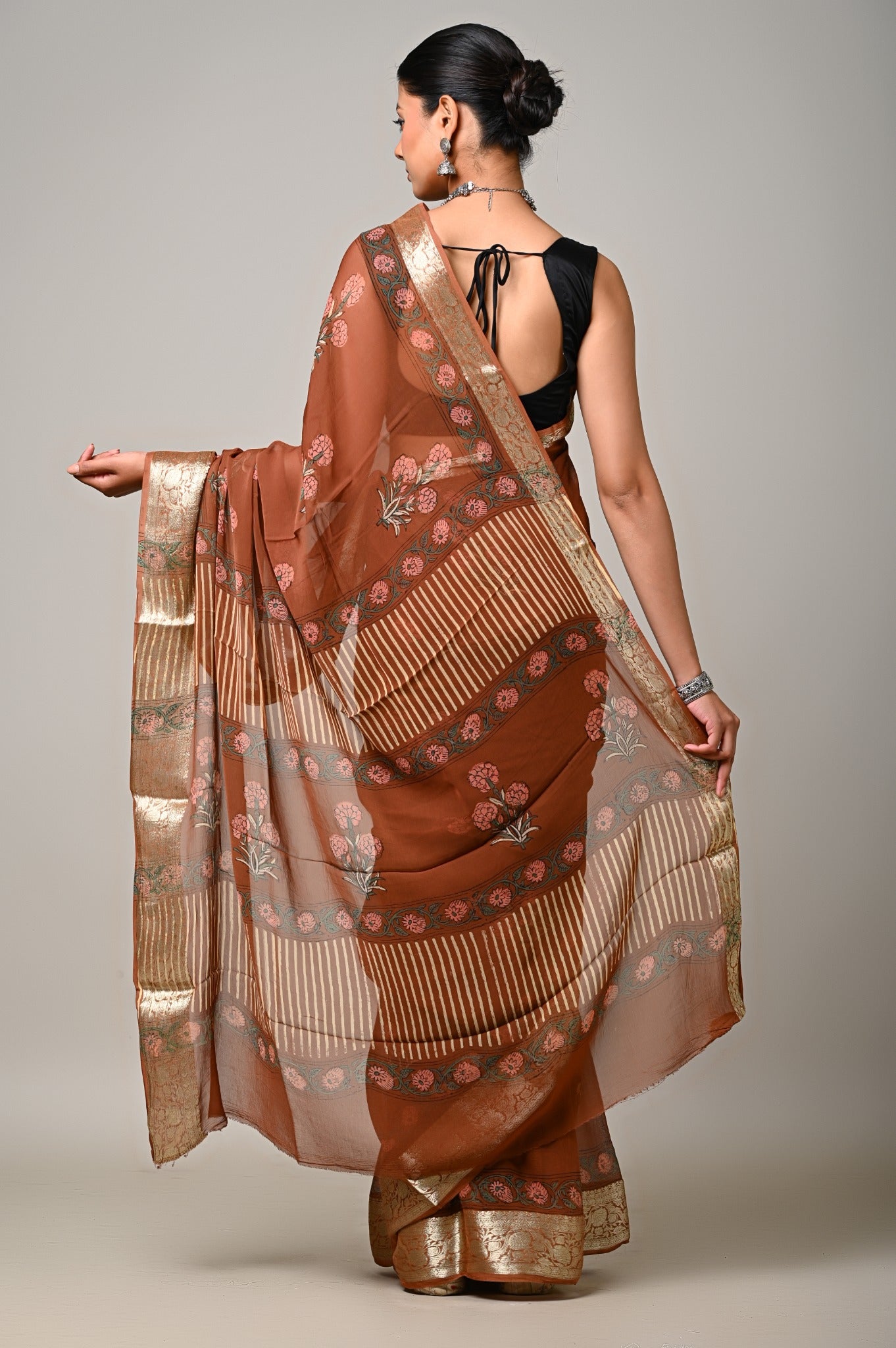 Rust brown chiffon saree pallu with floral handblock motifs stripes and metallic border